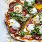 Ultimate 15 Minute Thin Crust Pizza with Arugula and Hot Honey. picture