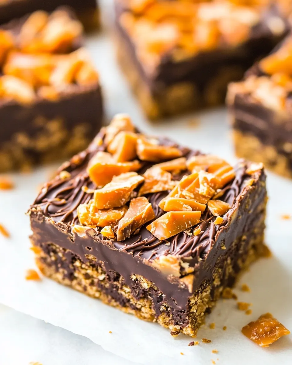 Sweet Chewy Chocolate Peanut Butter Butterfinger Bars shot