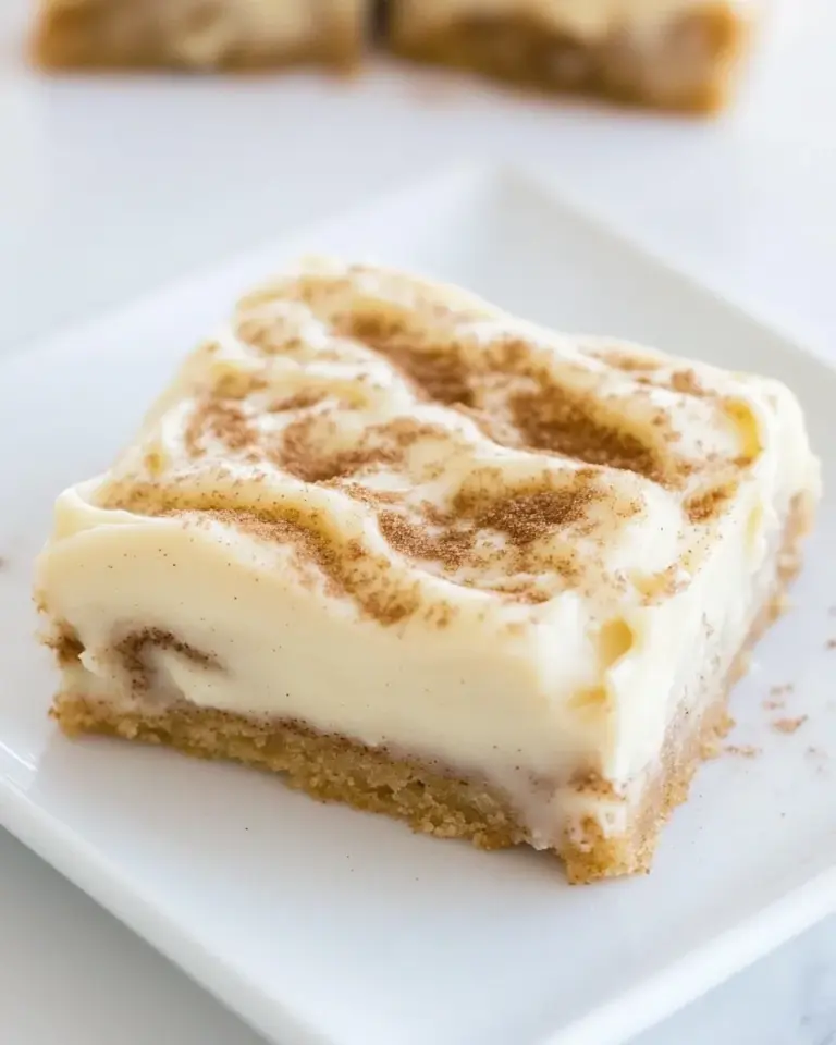 Homemade Cinnamon Roll Bars with Cream Cheese Frosting photo