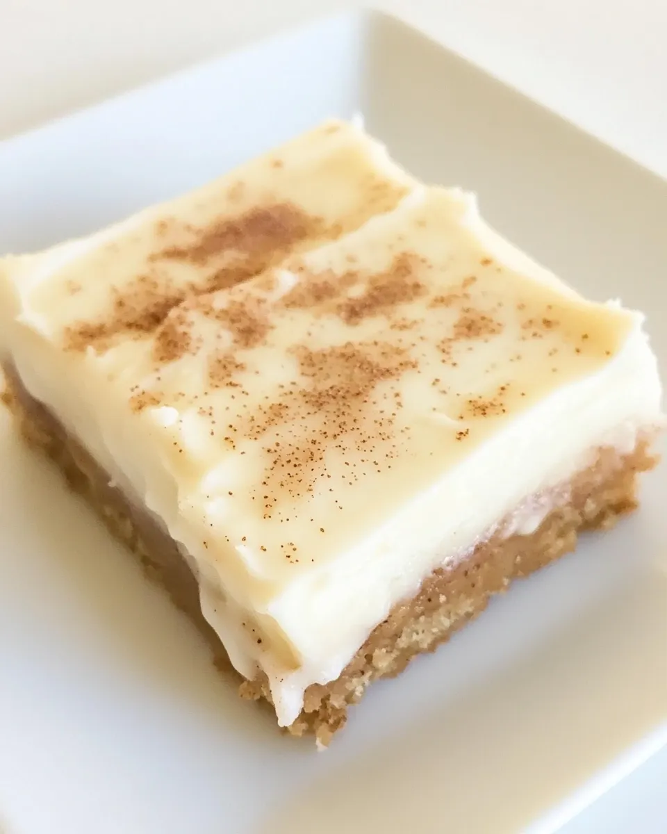 Delicious Cinnamon Roll Bars with Cream Cheese Frosting shot