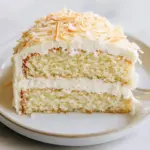 Homemade Coconut Cream Cake with Coconut Cream Cheese Frosting photo
