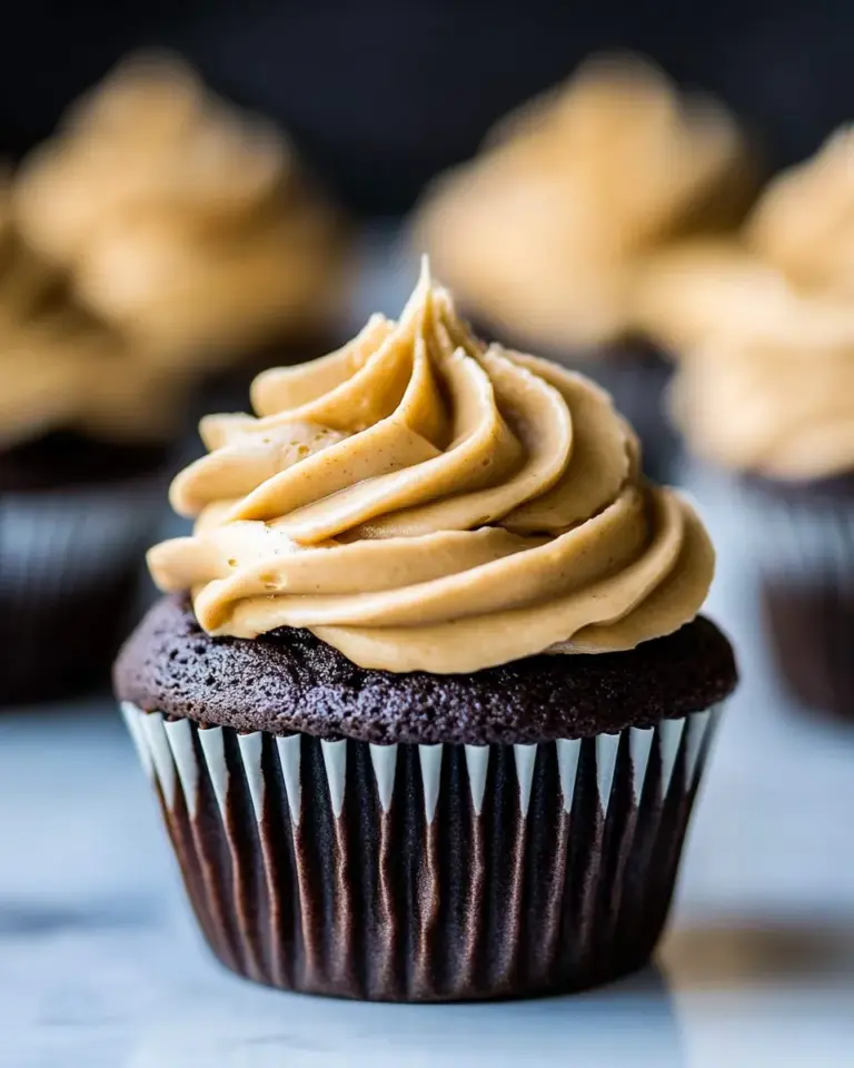 Homemade Dark Chocolate Cupcakes with Peanut Butter Frosting photo
