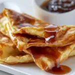 Homemade French Crpes w/ Vanilla Bean Ice Cream and Orange Jelly photo