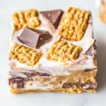 Quick Peanut Butter Cup Golden Grahams Smores Bars. photo