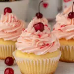 Homemade Pineapple Cupcakes with Cherry Buttercream photo