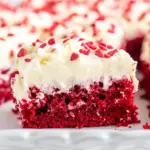 Homemade Red Velvet Poke Cake with Cream Cheese Frosting photo