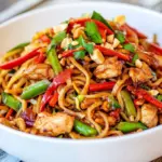 Homemade Spicy Thai Chicken and Veggie Noodles photo