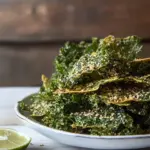 Homemade Spicy kale chips with tahini and sesame photo