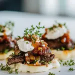 Homemade Steak Appetizer with Caramelized Onion and Boursin Garlic & Fine Herbs Cheese photo